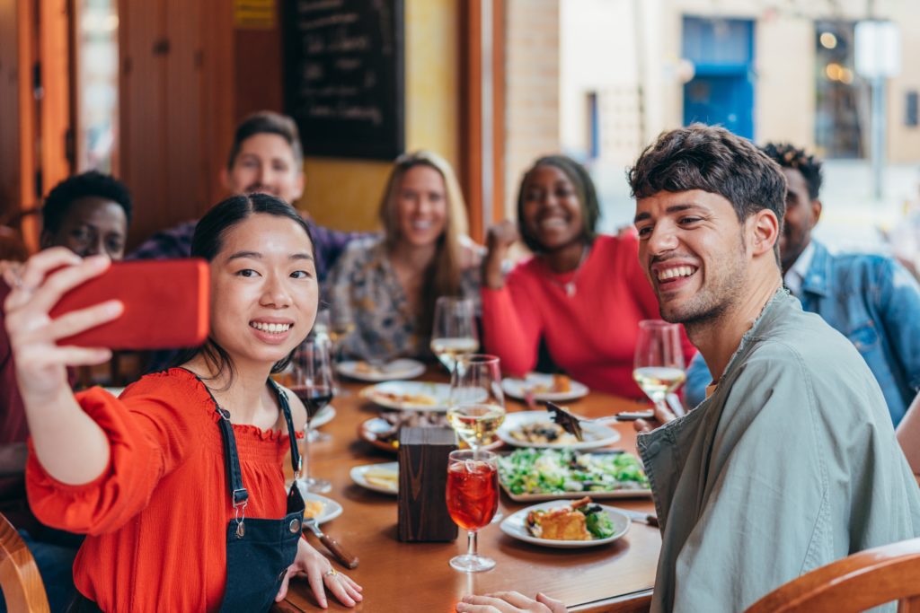 a group of people sitting at a table