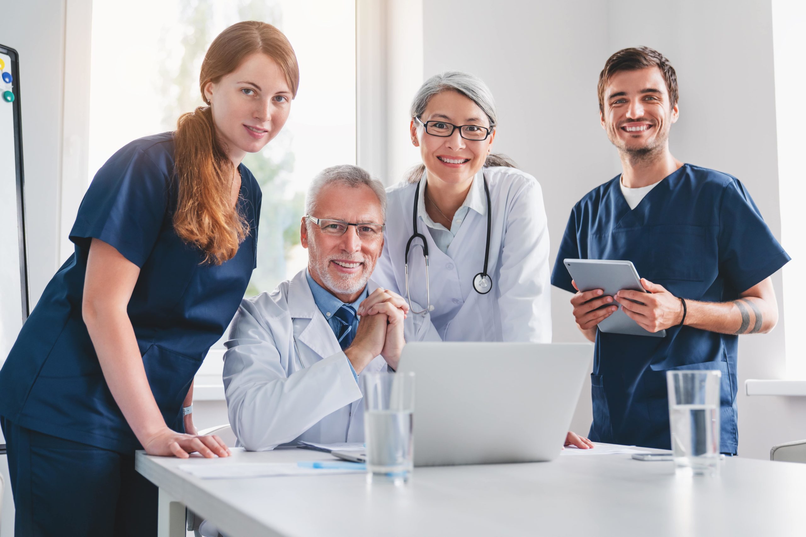 a group of doctors posing for a photo