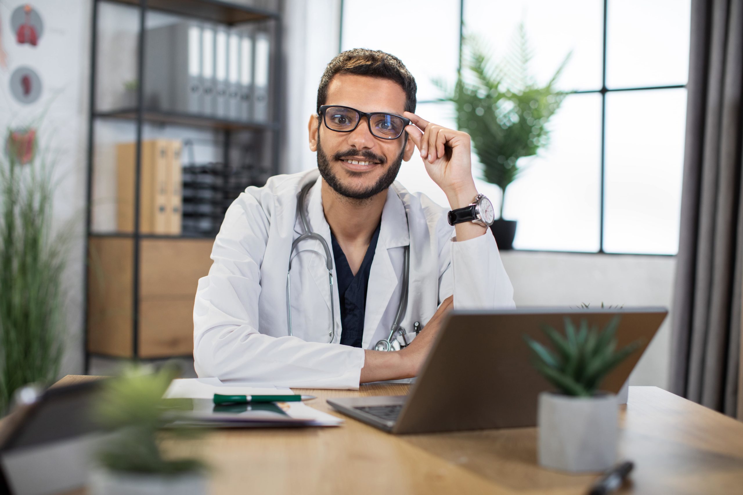 a man in a white coat