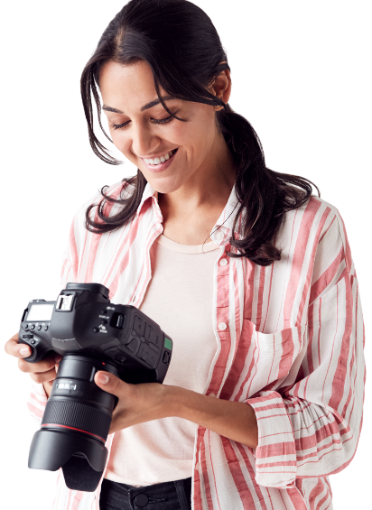 a woman holding a camera