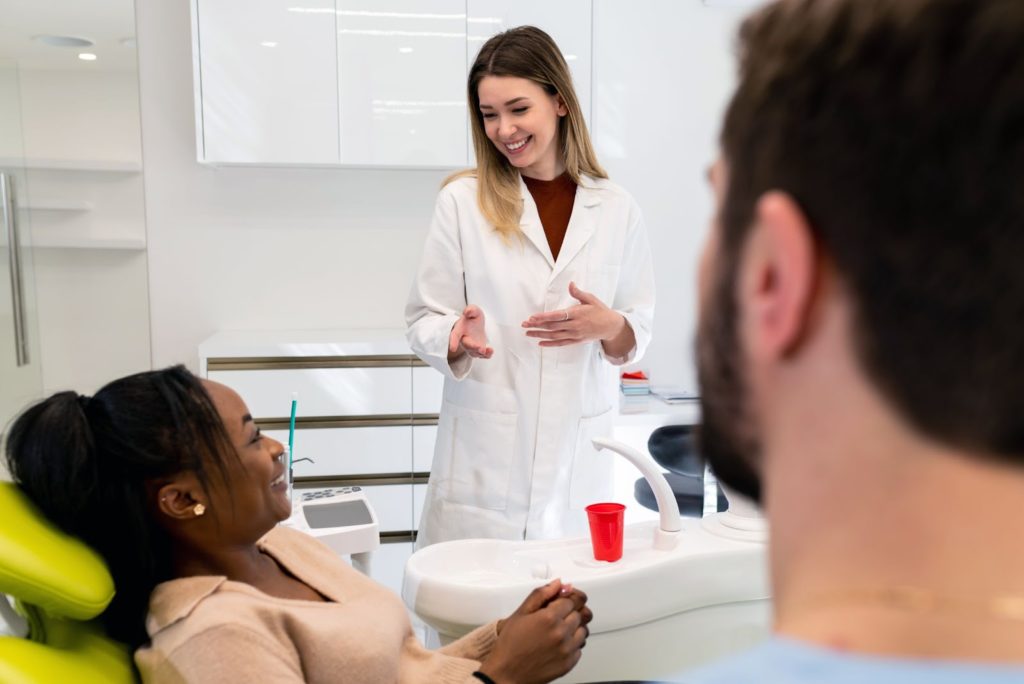 a group of people in a dental office